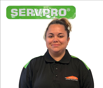female employee in SERVPRO shirt